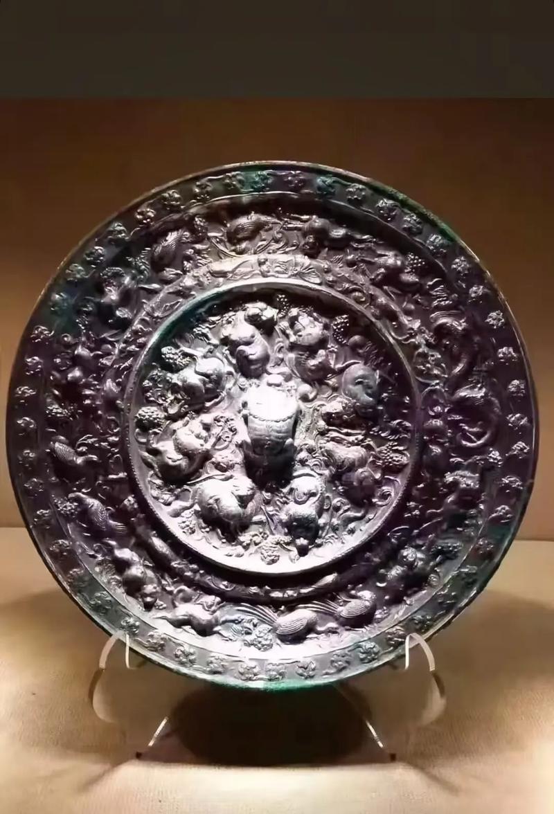 唐代铜镜工艺_铜镜拍卖成交价_海兽葡萄镜
